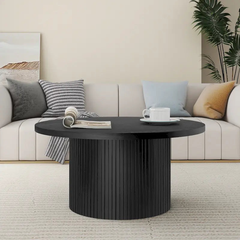 Table basse ronde
Table basse à piètement central