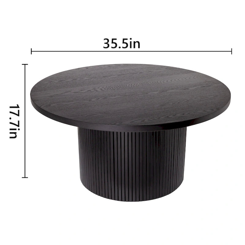 Table basse ronde
Table basse à piètement central