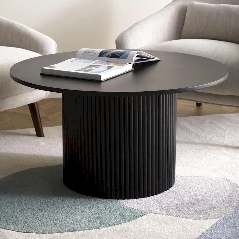 Table basse ronde
Table basse à piètement central