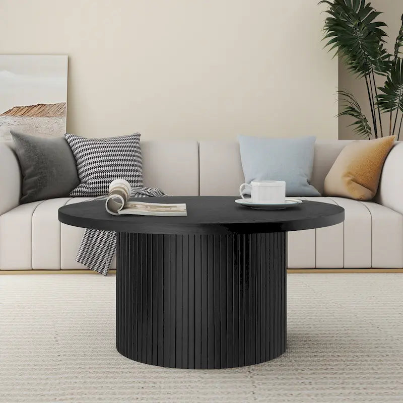 Table basse ronde
Table basse à piètement central