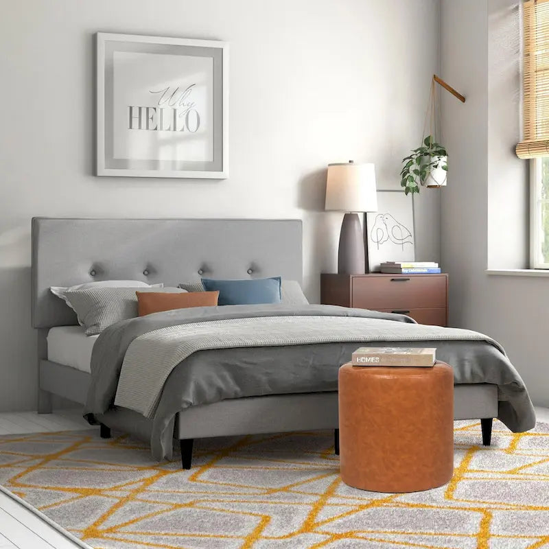 Pouf rond capitonné en similicuir pour repose-pieds